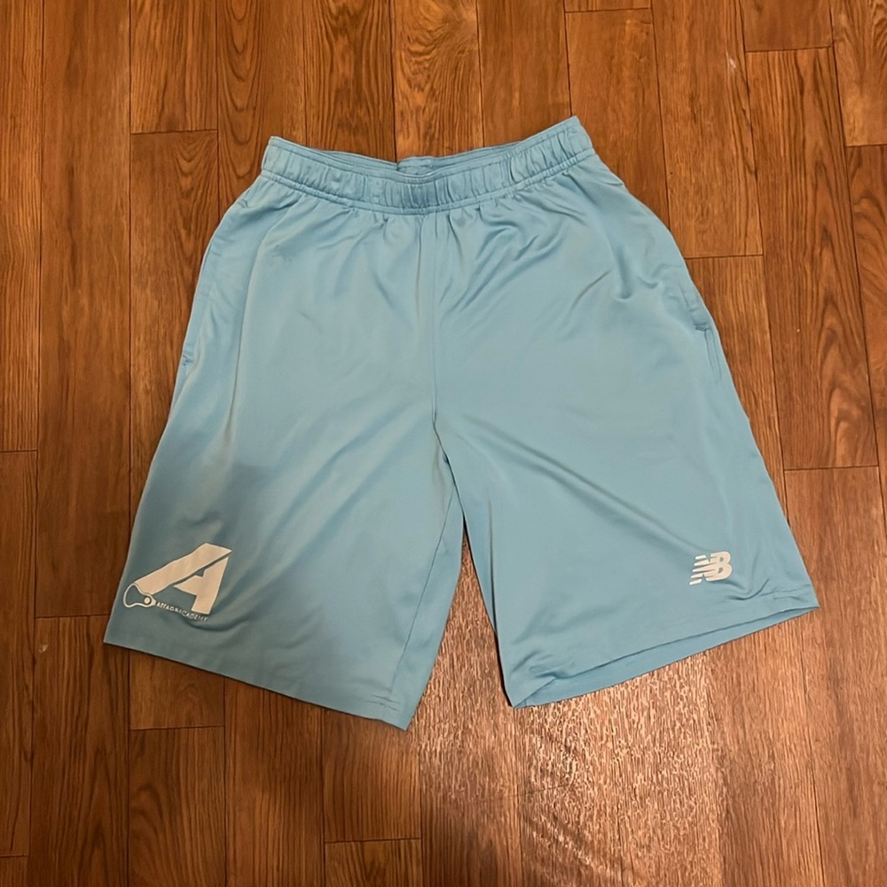 New Balance light blue drawstring shorts